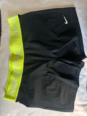 Nike Black Compression Shorts with Neon Yellow Waistband